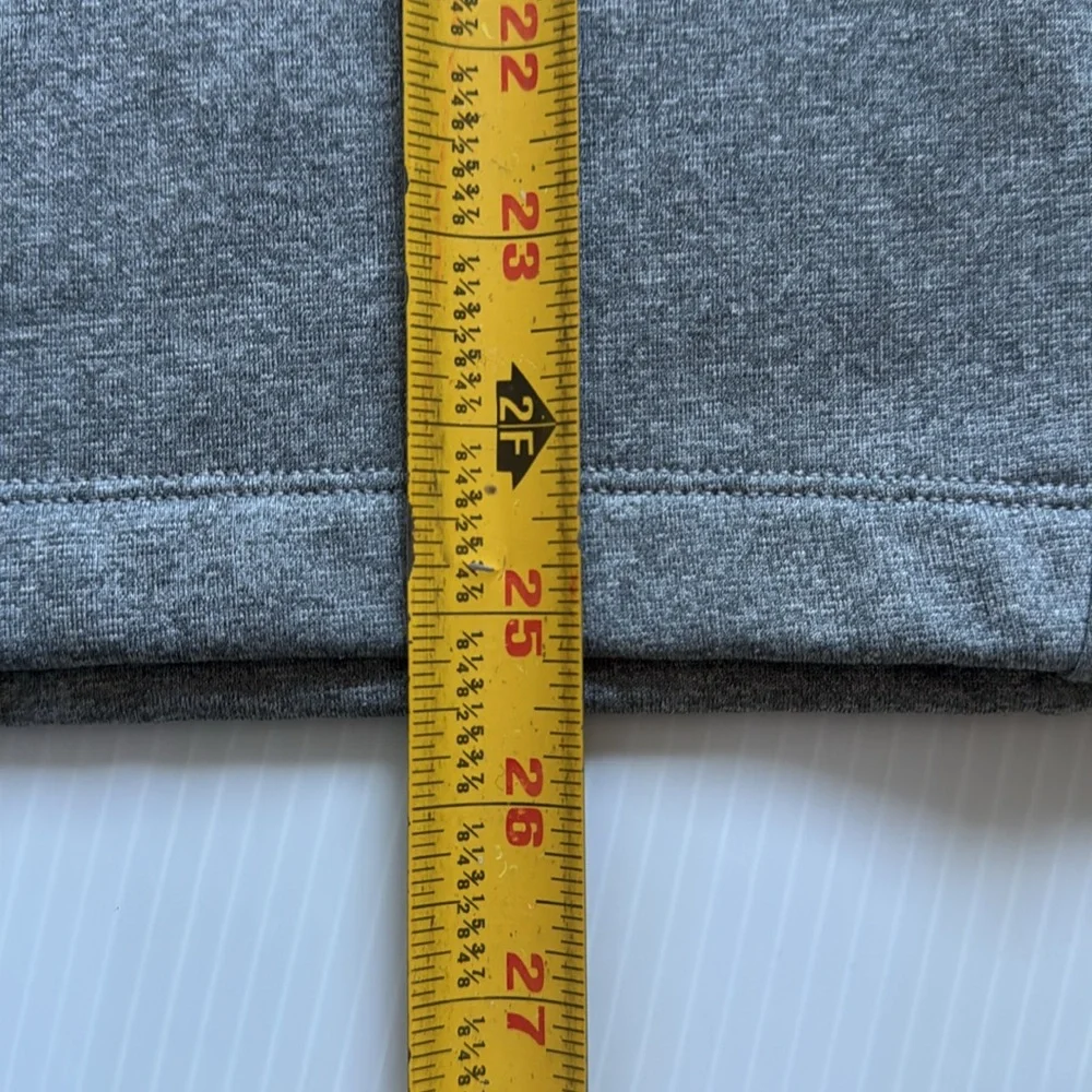 The North Face Men’s gray quarter zip with blue details.  Size medium